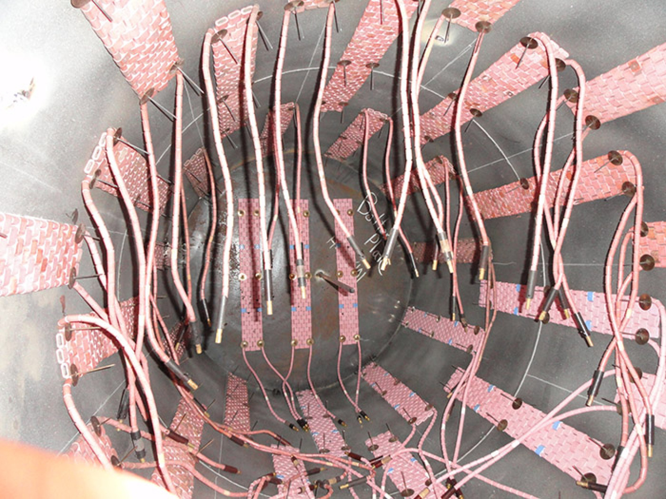 The mock glass container was heated to more than 400 degrees Fahrenheit using industrial heating pads as part of testing for the immobilized low-activity waste transporter system.