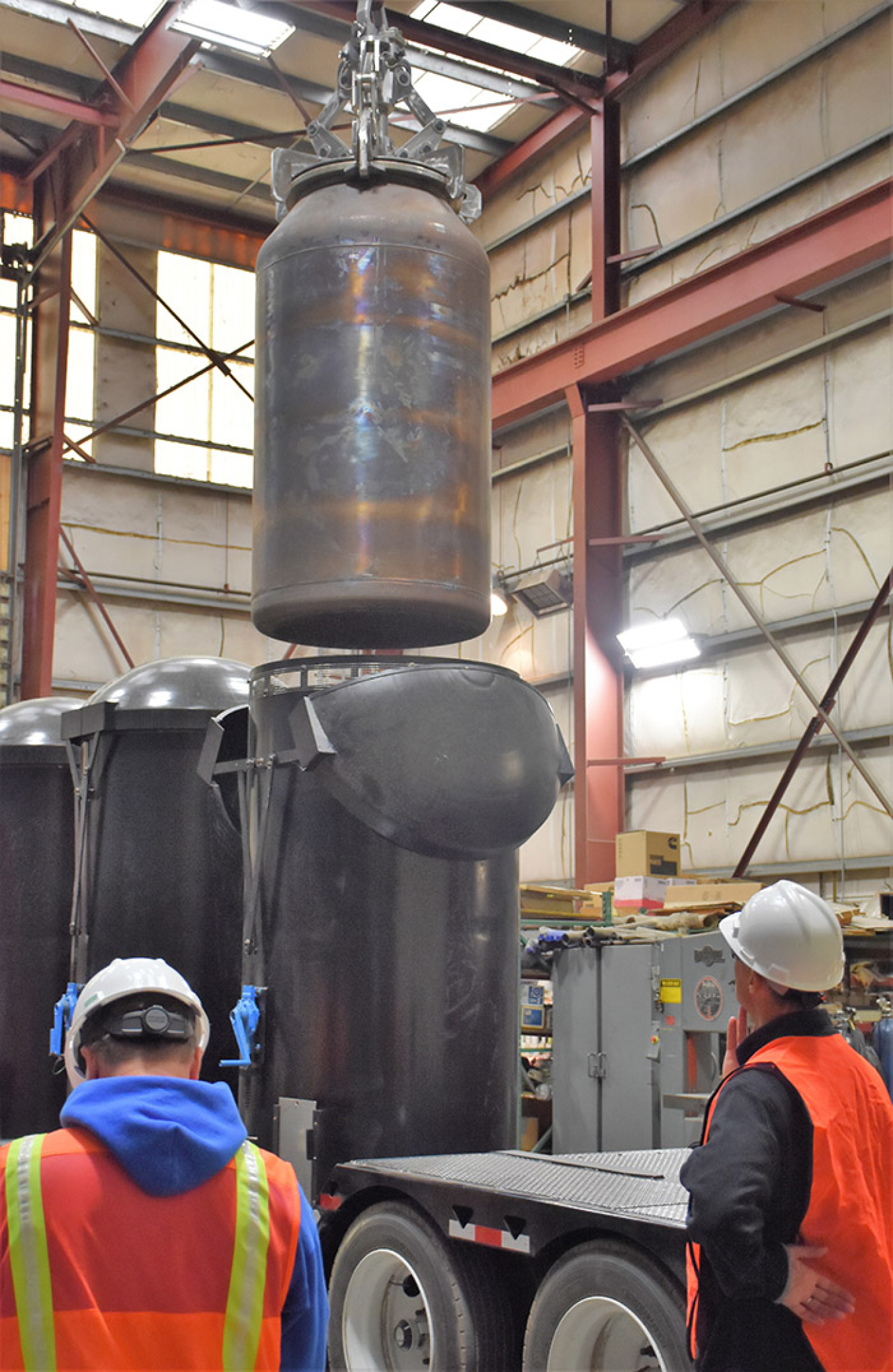 The immobilized low-activity waste transporter system consists of a trailer with three pallets, which will be loaded with containers of tank waste mixed with hot glass for transport to Hanford’s Integrated Disposal Facility.