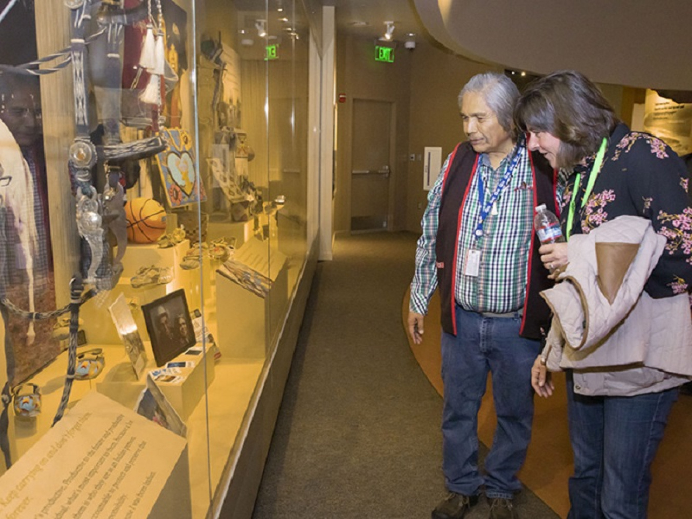 Wanapum Band Tribal Elder Rex Buck, Jr. and EM Assistant Secretary Anne White view a display of artifacts at the Wanapum Heritage Center.