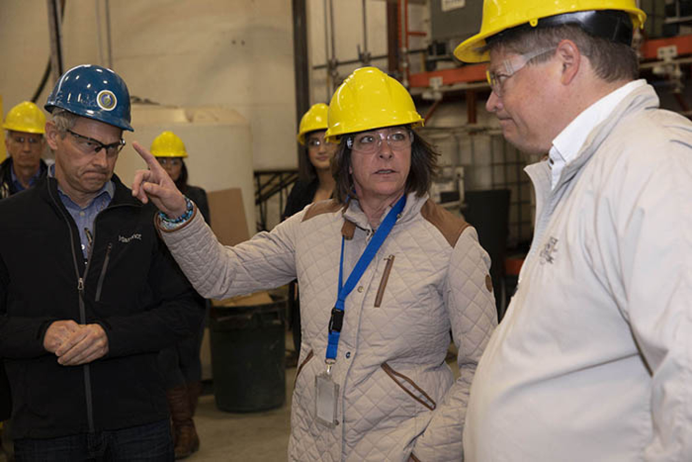 EM Assistant Secretary Anne White, center, talks to Brian Brendel, president of Columbia Energy and Environmental Services, right, as Rob Hastings, assistant manager, Hanford Office of River Protection Tank Farms, looks on. White visited Hanford to get an