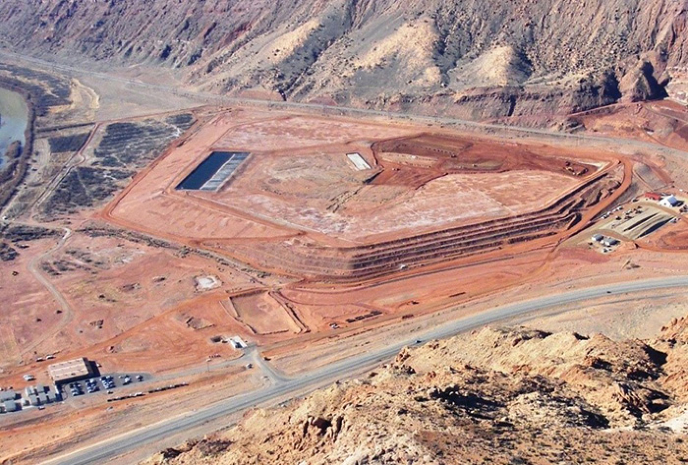 A comparison of the Moab Site in 2009 (at top) versus 2018 shows progress in reducing the mill tailings pile along with the removal of the evaporation pond and the addition of drying beds for tailings.