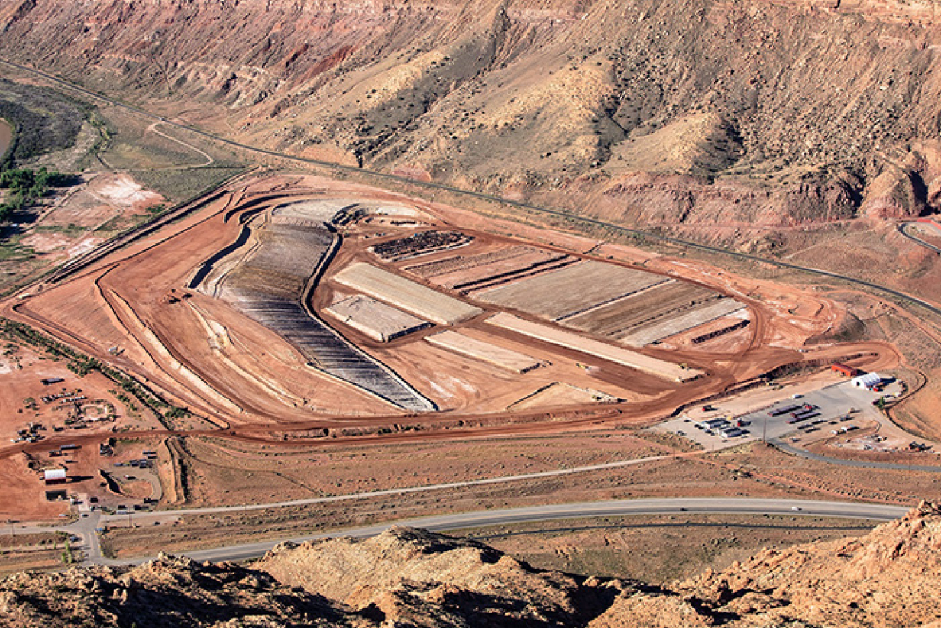 A comparison of the Moab Site in 2009 (at top) versus 2018 shows progress in reducing the mill tailings pile along with the removal of the evaporation pond and the addition of drying beds for tailings.