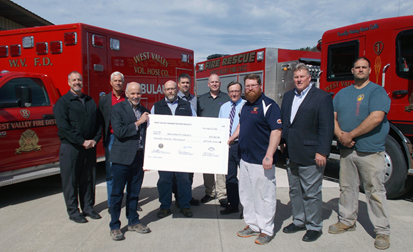 Representatives from EM, cleanup contractor CH2MHILL BWXT West Valley (CHBWV), and the New York State Energy Research and Development Authority recently presented checks to Bertrand Chaffee Hospital, Mercy Flight, and the West Valley Fire District.