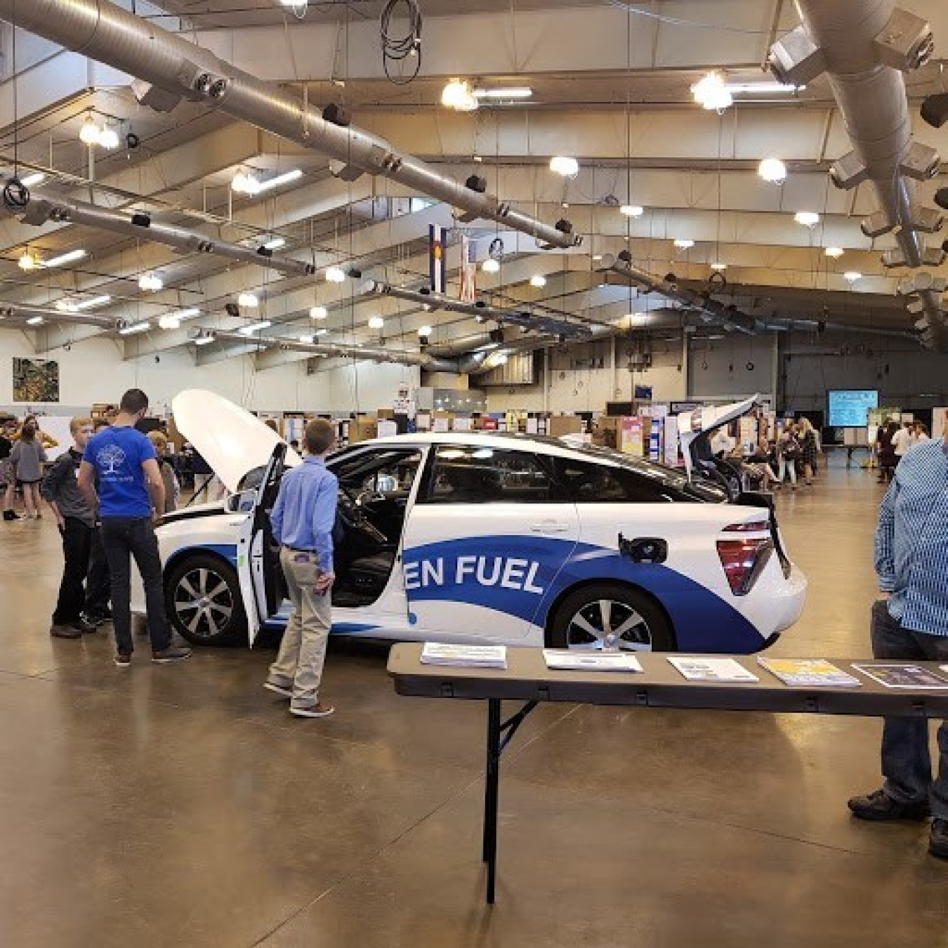 Students look inside a Toyota Mirai fuel cell electric vehicle