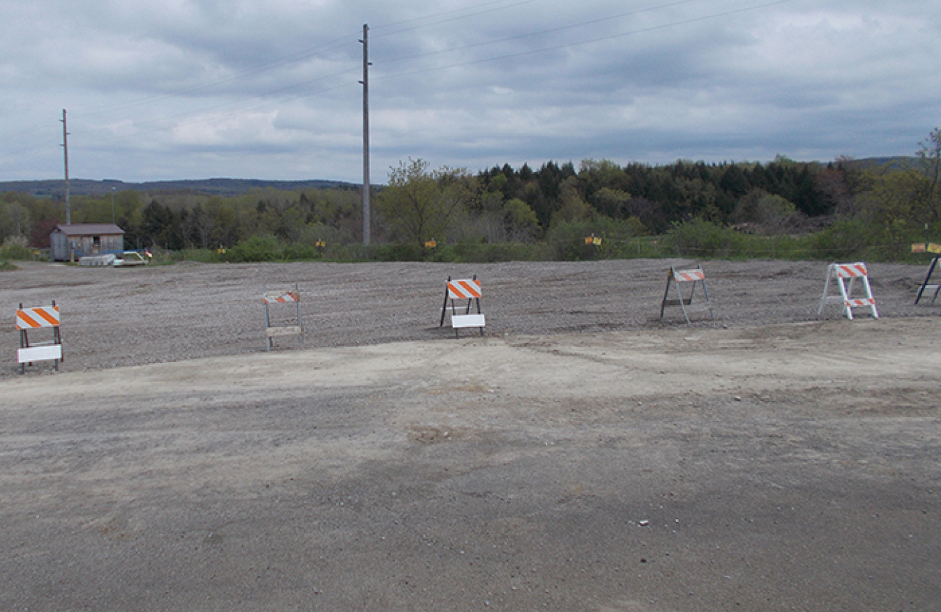 Workers recently completed the building pad demolition and restored the area.