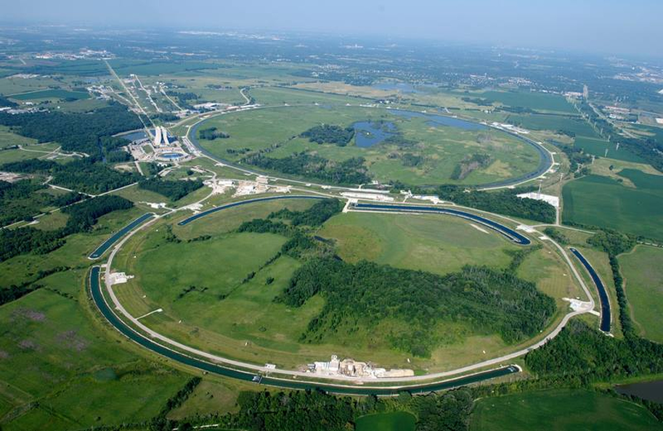 A new method improves the circulating beams in the Recycler Ring (which is located underground, beneath the long, skinny ponds shown here). The ring is a major component of Fermilab’s accelerator chain.