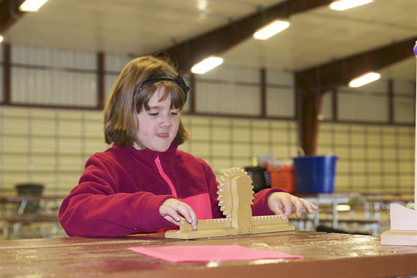 A student learns about gears at the recent Fluor Idaho STEAM Days at the Idaho Falls Zoo.