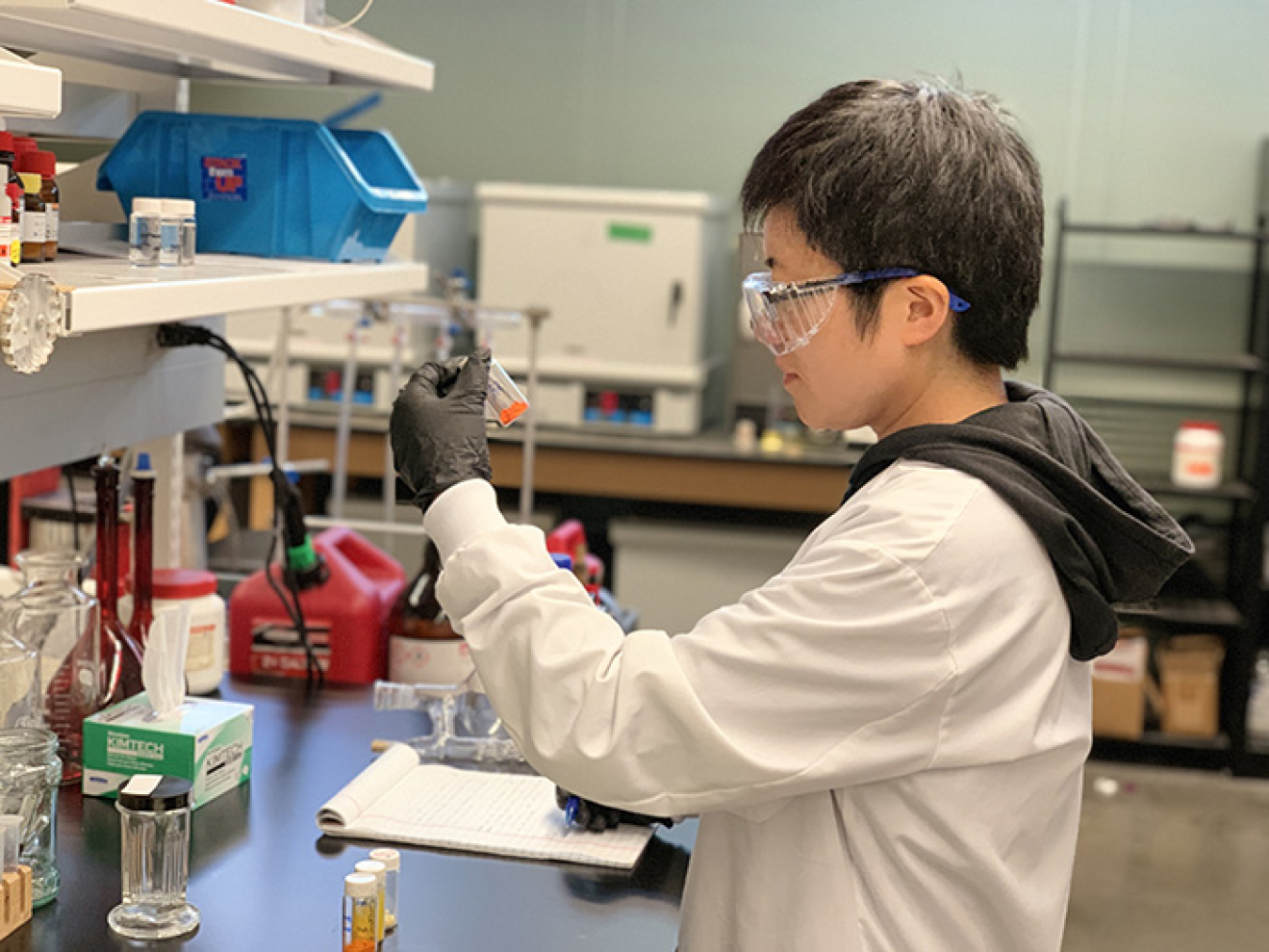 Qi Sun, a postdoctoral scholar at the University of South Florida (USF), checks a material as part of Pacific Northwest National Laboratory-USF research that could benefit legacy waste cleanup.