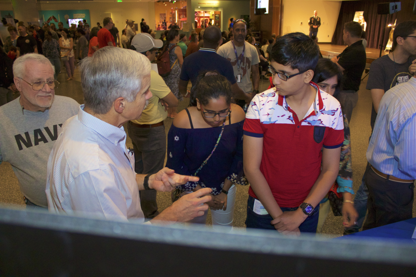 Dr. Steve Azevedo explaining Lawrence Livermore National Laboratory's technologies to museumgoers during Military Invention Day at the National Museum of American History.