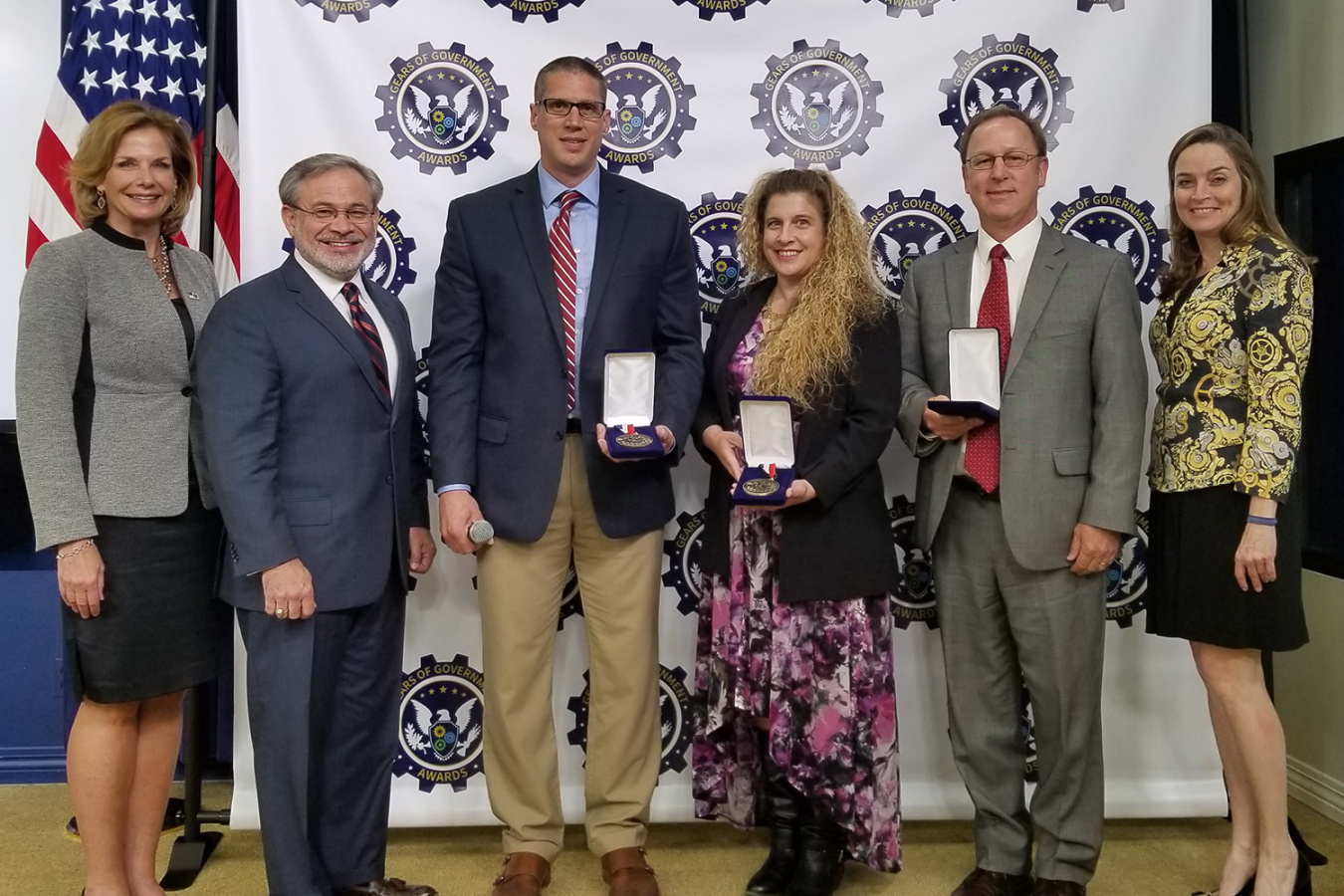 From left, NNSA Administrator Lisa E. Gordon-Hagerty, Deputy Secretary of Energy Dan Brouillette, Marc Gibson of NASA, Angela Chambers of NNSA, Lee Mason of NASA, Margaret Weichert of OMB. Not pictured: William Pulse of NNSA.