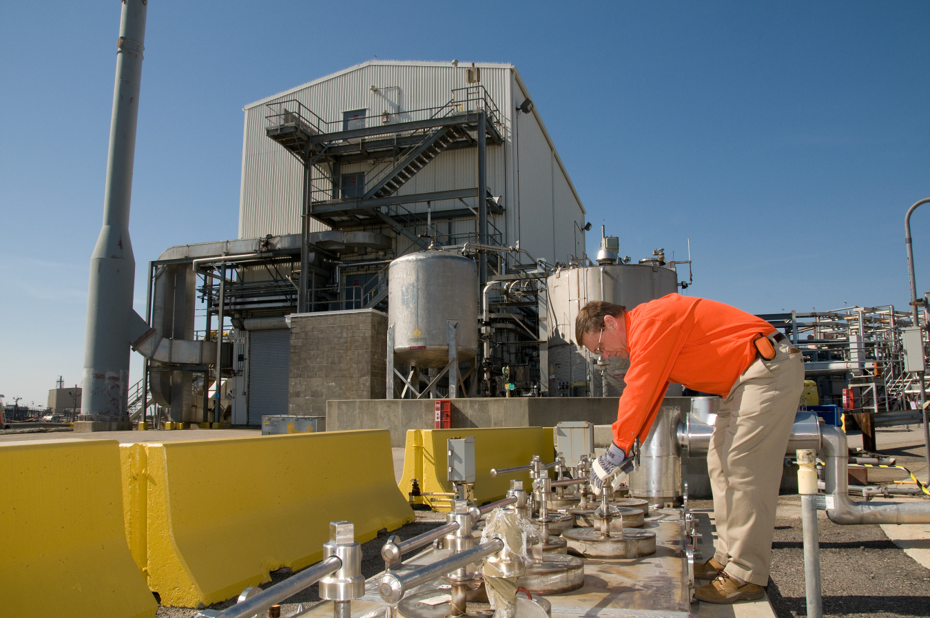 A Savannah River Remediation employee works outside the Actinide Removal Process in H Tank Farm.