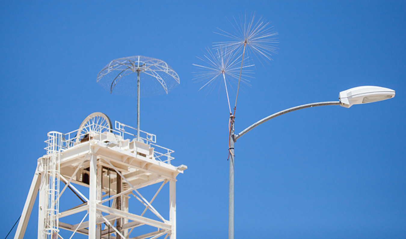 Waste Isolation Pilot Plant workers added small arrays atop light poles to expand coverage between the lightning protection system’s larger units.