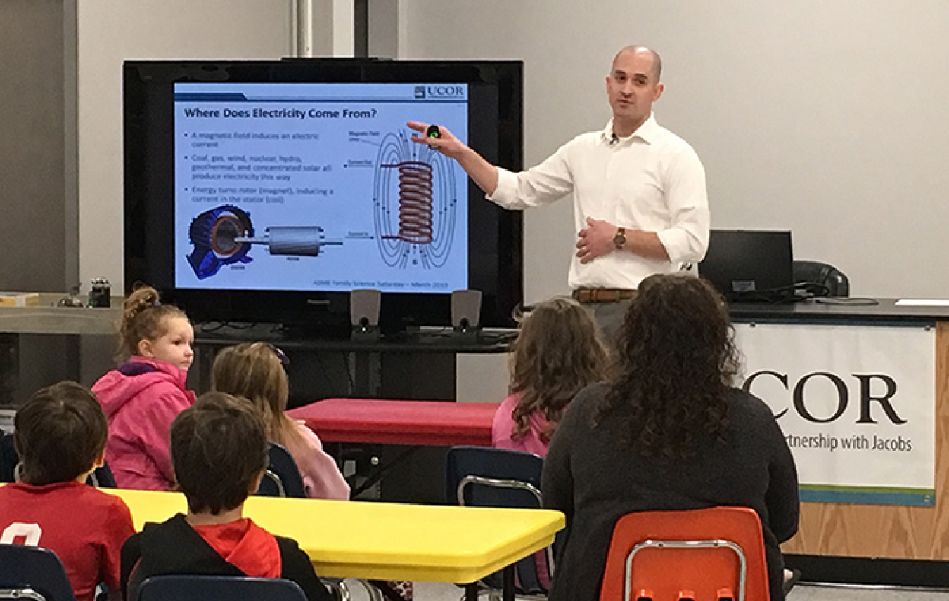 Tommy Morgan speaks to visitors at the American Museum of Science and Energy in Oak Ridge.