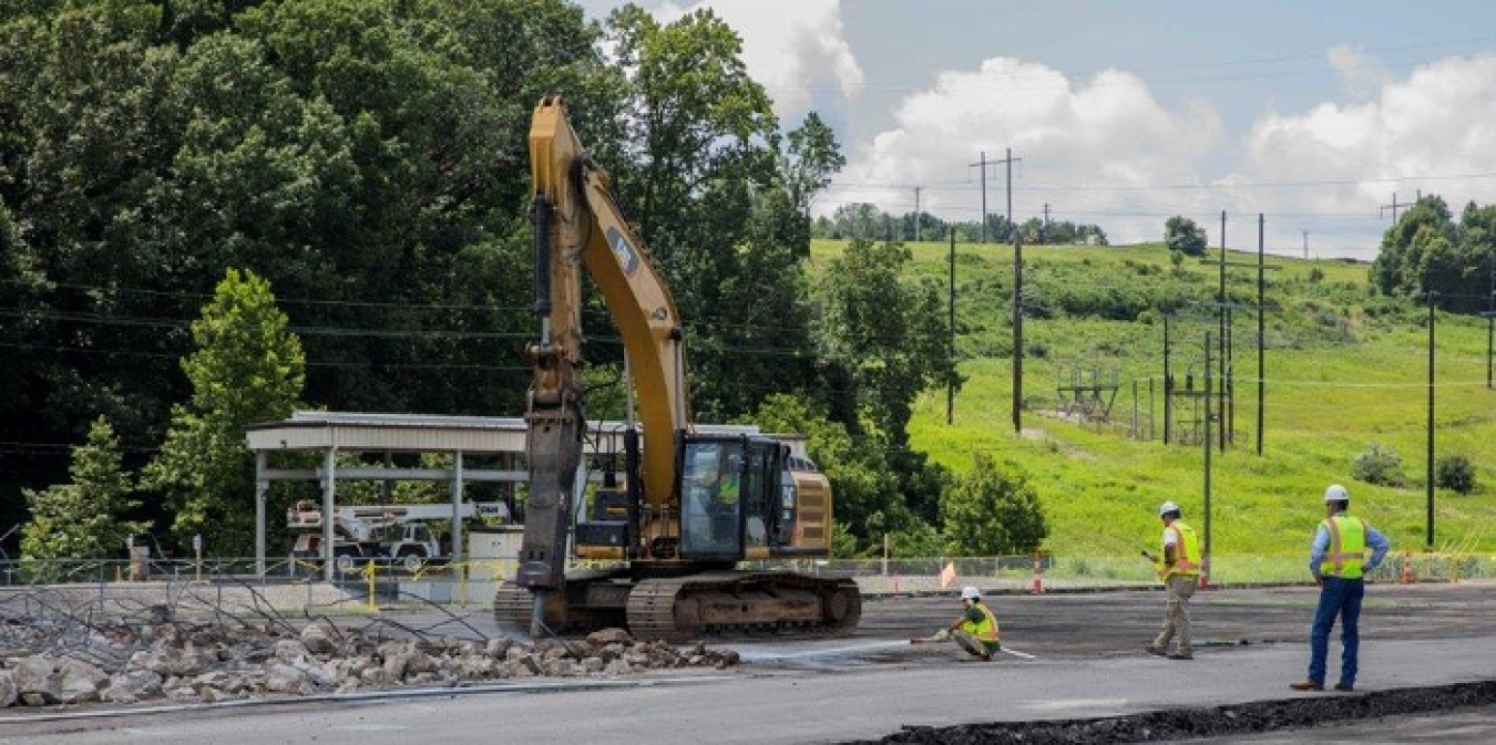 Oak Ridge Site workers remove asphalt and concrete on the east end of the Y-12 National Security Complex to prepare the site of the Mercury Treatment Facility’s treatment plant.