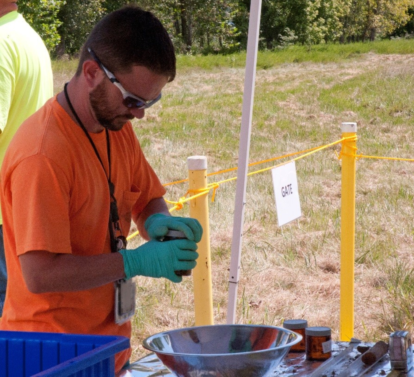 A technician with PPPO's Portsmouth Environmental Monitoring Program prepares an environmental media sample for analysis. 