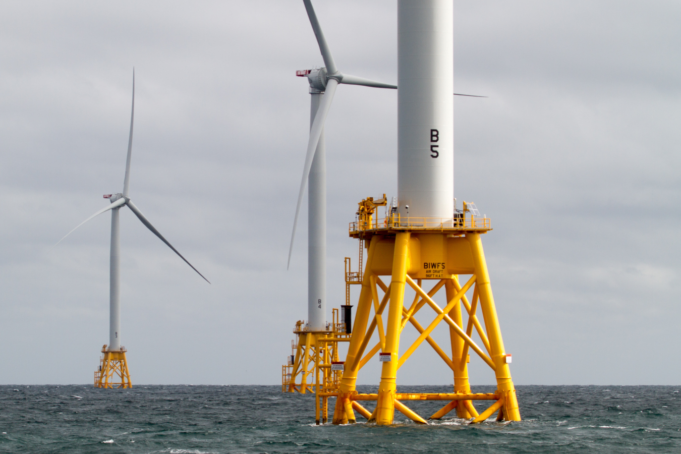 offshore wind turbines in the ocean.