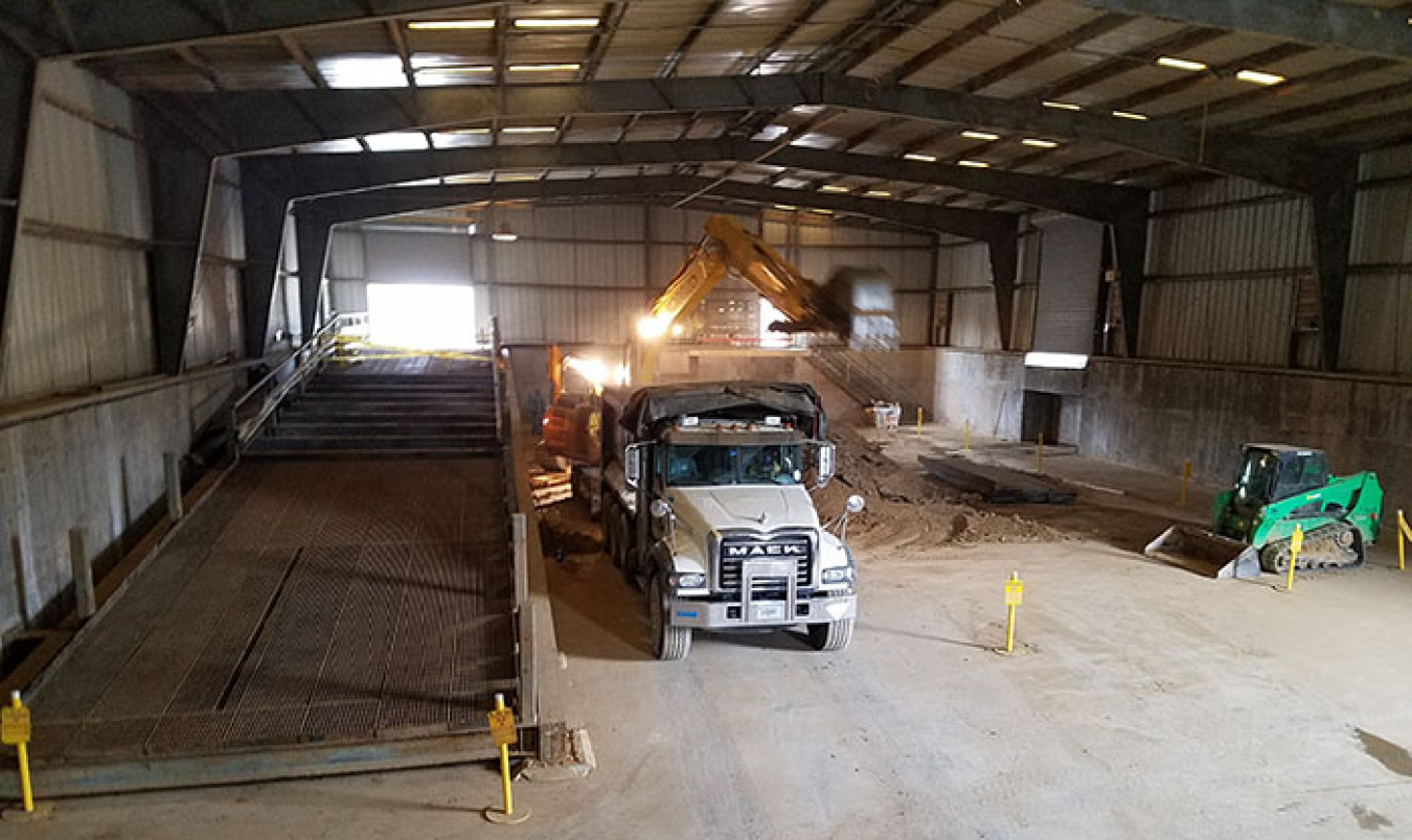 This photo shows workers nearing completion of the project to remove 4,071 cubic yards of soil that had been in storage in an Oak Ridge Site facility since 1989.