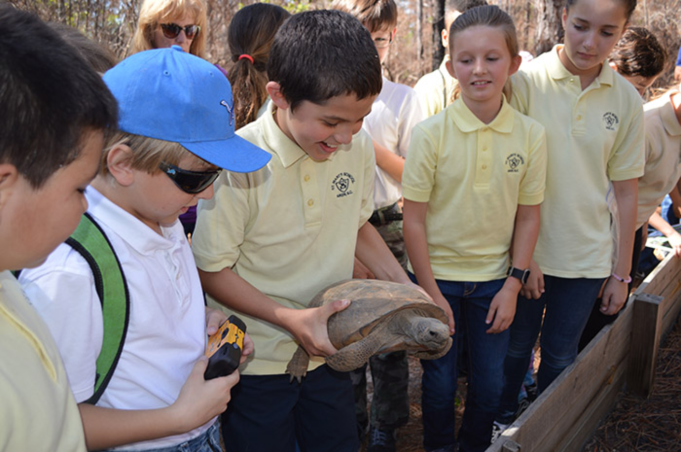 Elementary school students marvel at a gopher tortoise on the “Ecologist for a Day” trail. The event at the Savannah River Site was organized by University of Georgia’s Savannah River Ecology Laboratory. 