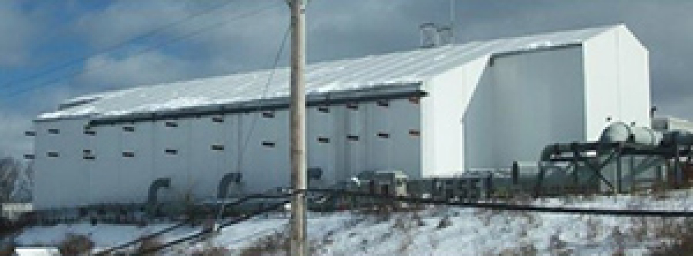 Workers finished building a tent enclosure over Building H2 in 2012.