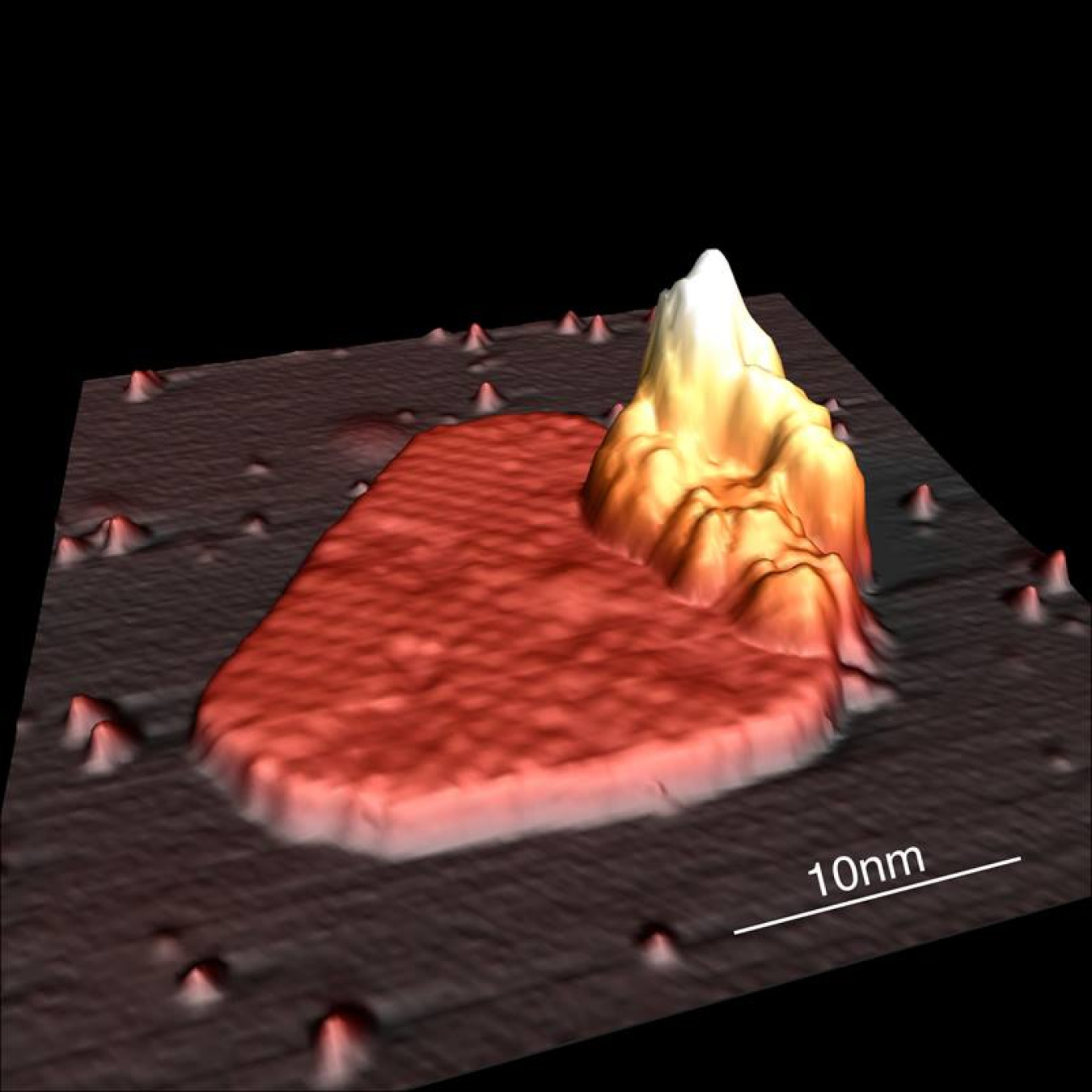 A faceted metal island of the rare-earth element dysprosium formed under a layer of graphite. The team deposited the metal at 577 degrees Celsius after they bombarded graphite with argon ions.