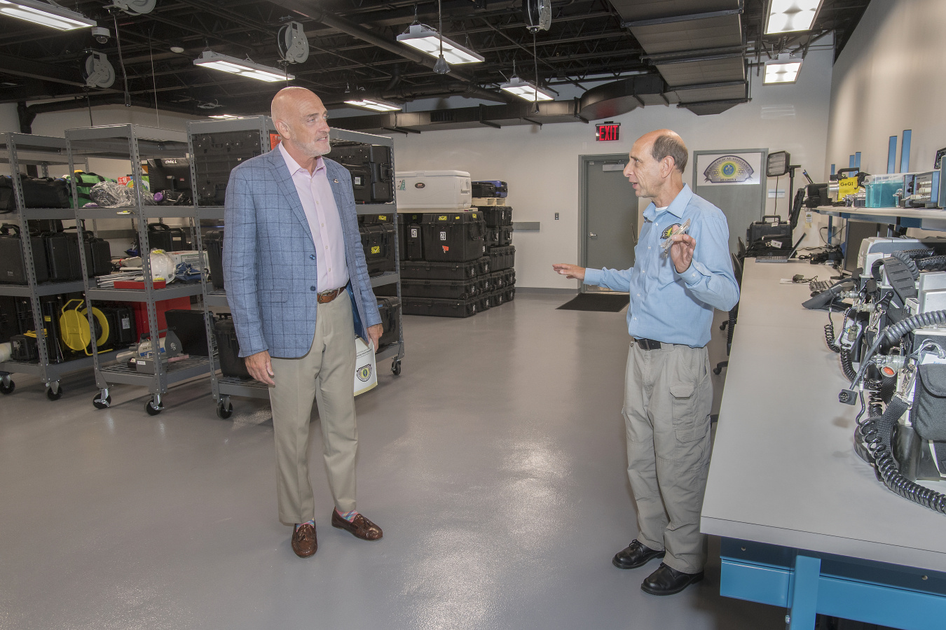 NNSA Associate Administrator and Deputy Under Secretary for Counterterrorism and Counterproliferation Jay Tilden receives a tour of the Brookhaven National Laboratory facility from RAP 1 Regional Equipment Manager Paul Philipsberg.