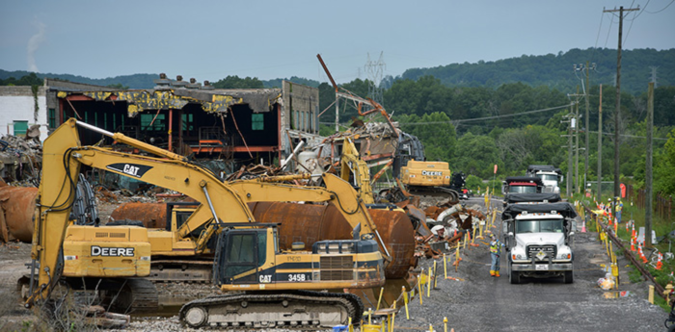 Workers remove debris from the sites of the K-131 and K-631 demolitions at the East Tennessee Technology Park.