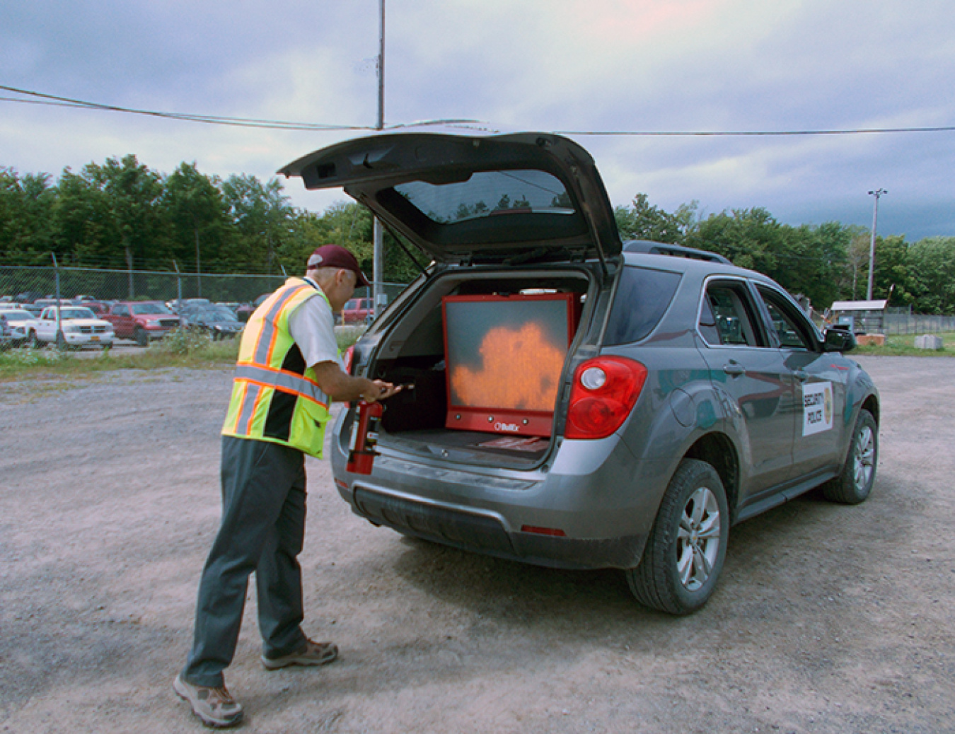 John Rendall, deputy general manager with CH2M HILL BWXT West Valley, uses a fire extinguisher simulator to put out a mock fire at EM’s West Valley Demonstration Project.