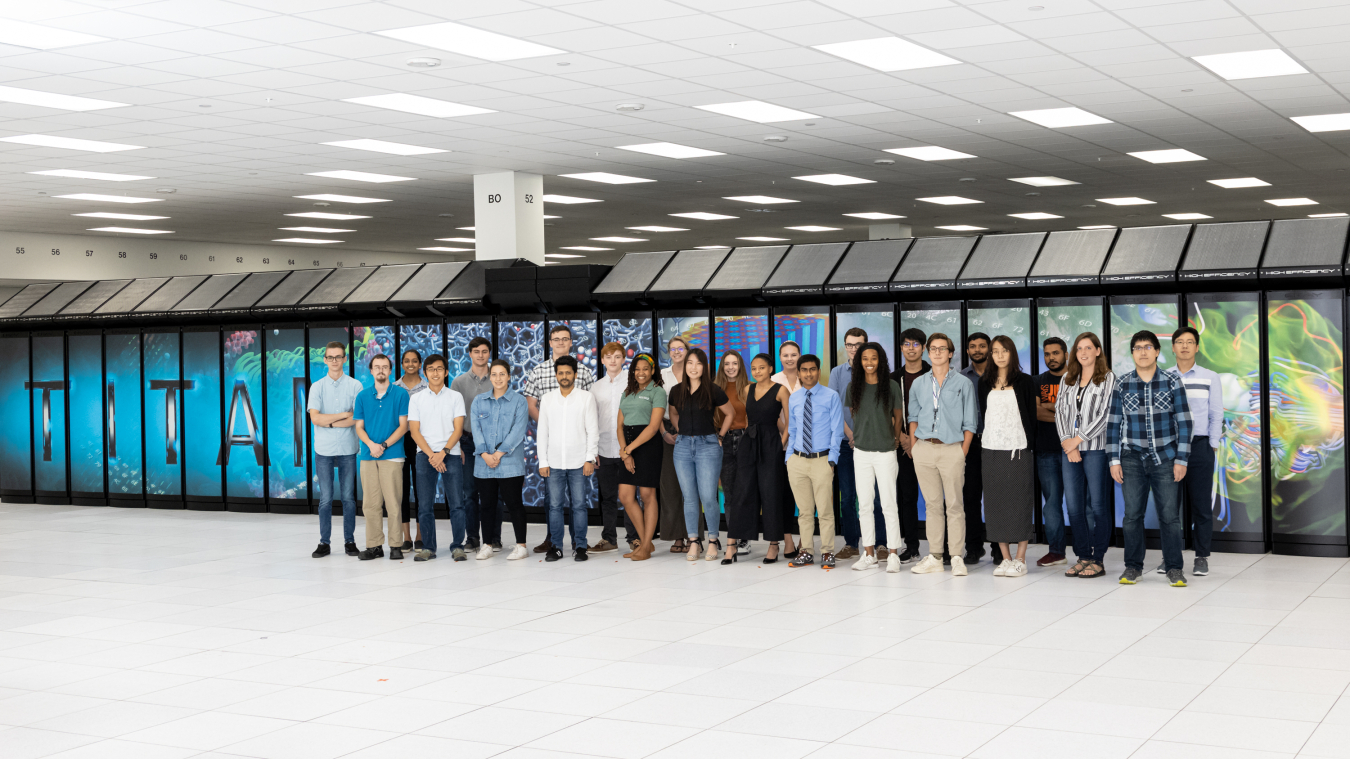 The NCCS/OLCF 2019 interns shown in front of Titan before it was decommissioned in August.