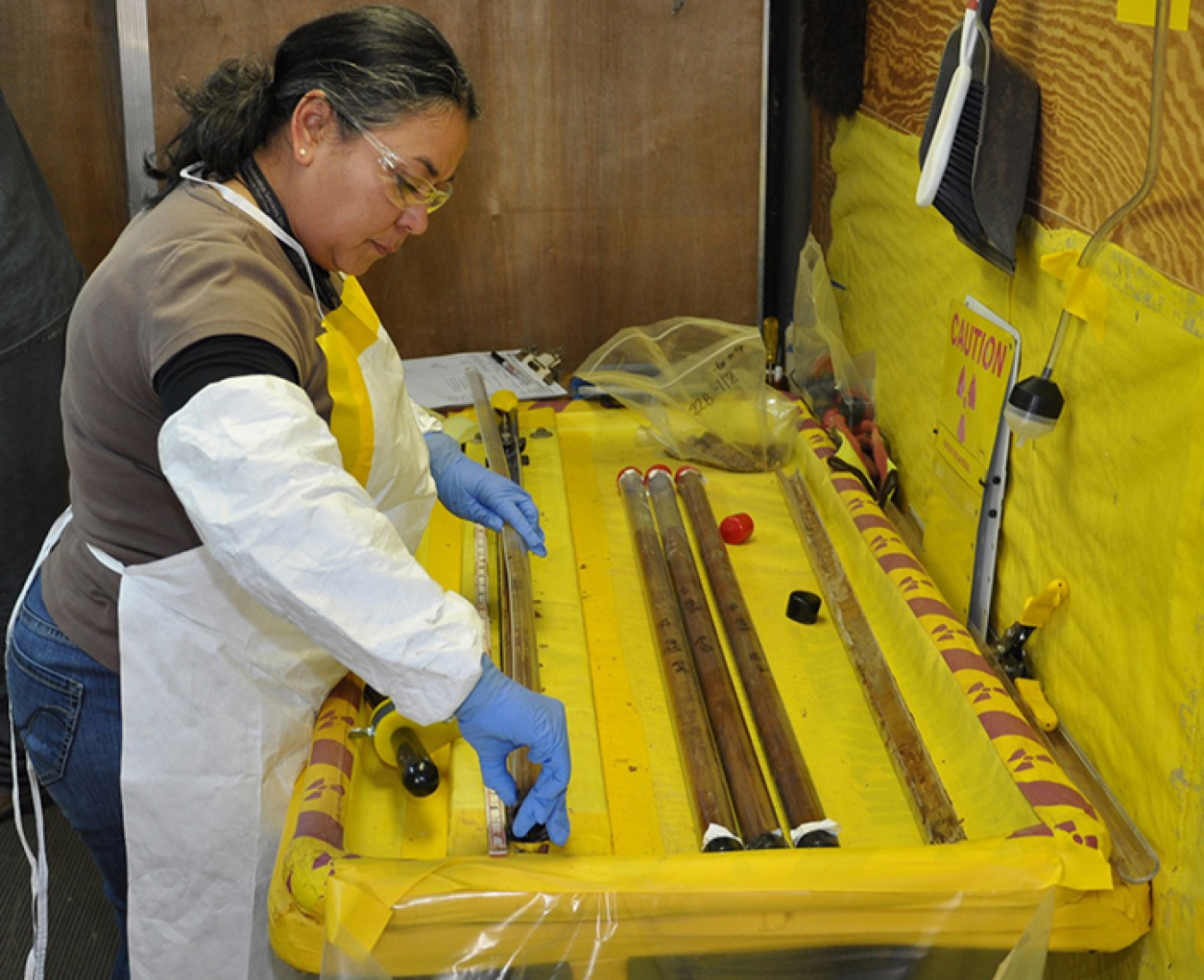 Soil samples are packaged and sent for testing in a laboratory.