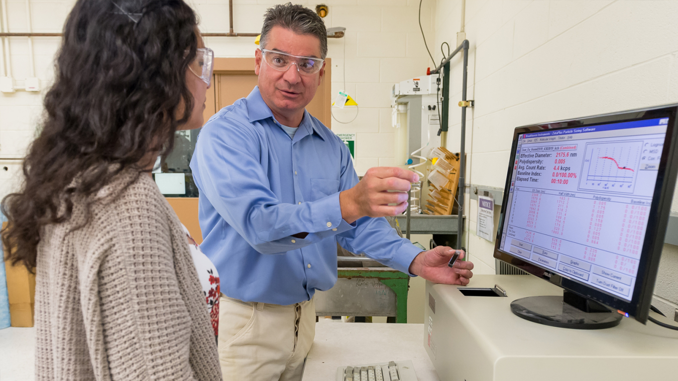 Mike Kaminski (here with Noemy Escamilla) co-founded the Argonne Hispanic/Latino Club in 2003. Today, as president, he is working to expand the club’s connection to local communities.