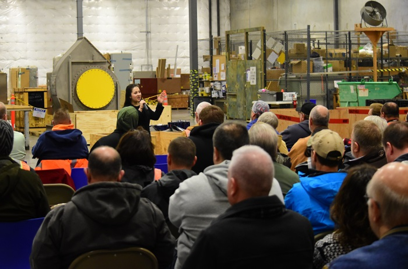 Michelle Molina of Bechtel National Inc. provides a safety briefing at the beginning of an employee meeting at the Hanford Waste Treatment and Immobilization Plant (WTP). 