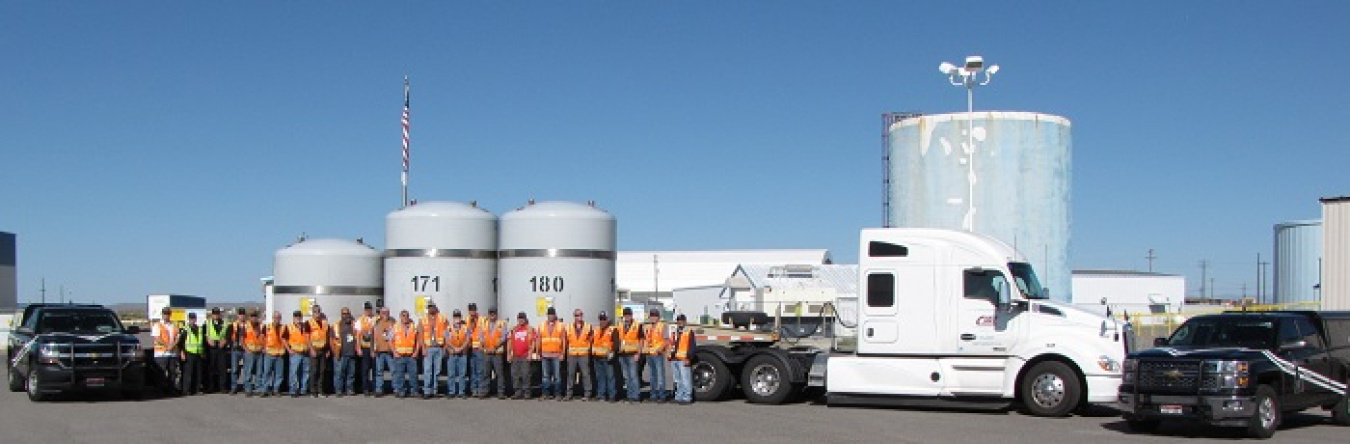 EM crews pose with Idaho State Police (ISP) officers in advance of the 500th shipment of transuranic waste leaving the Radioactive Waste Management Complex, headed for the Waste Isolation Pilot Plant. 