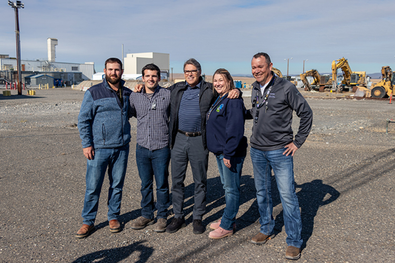 Energy Secretary Rick Perry, center, thanked, from left, Mike Garza, Gabriel Mosbrucker, Amanda Gustafson, and Frank Vargas with contractor CH2M HILL Plateau Remediation Company for their contributions.