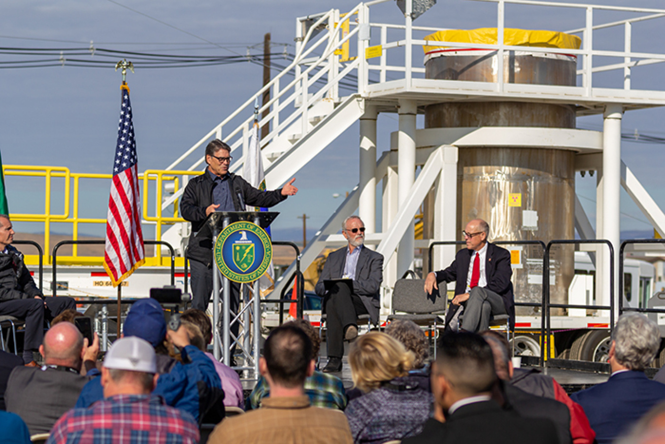 Energy Secretary Rick Perry welcomes invited guests and thanks Hanford workers during a celebration marking the completion of a decade-long project to remove contaminated sludge from near the Columbia River. 