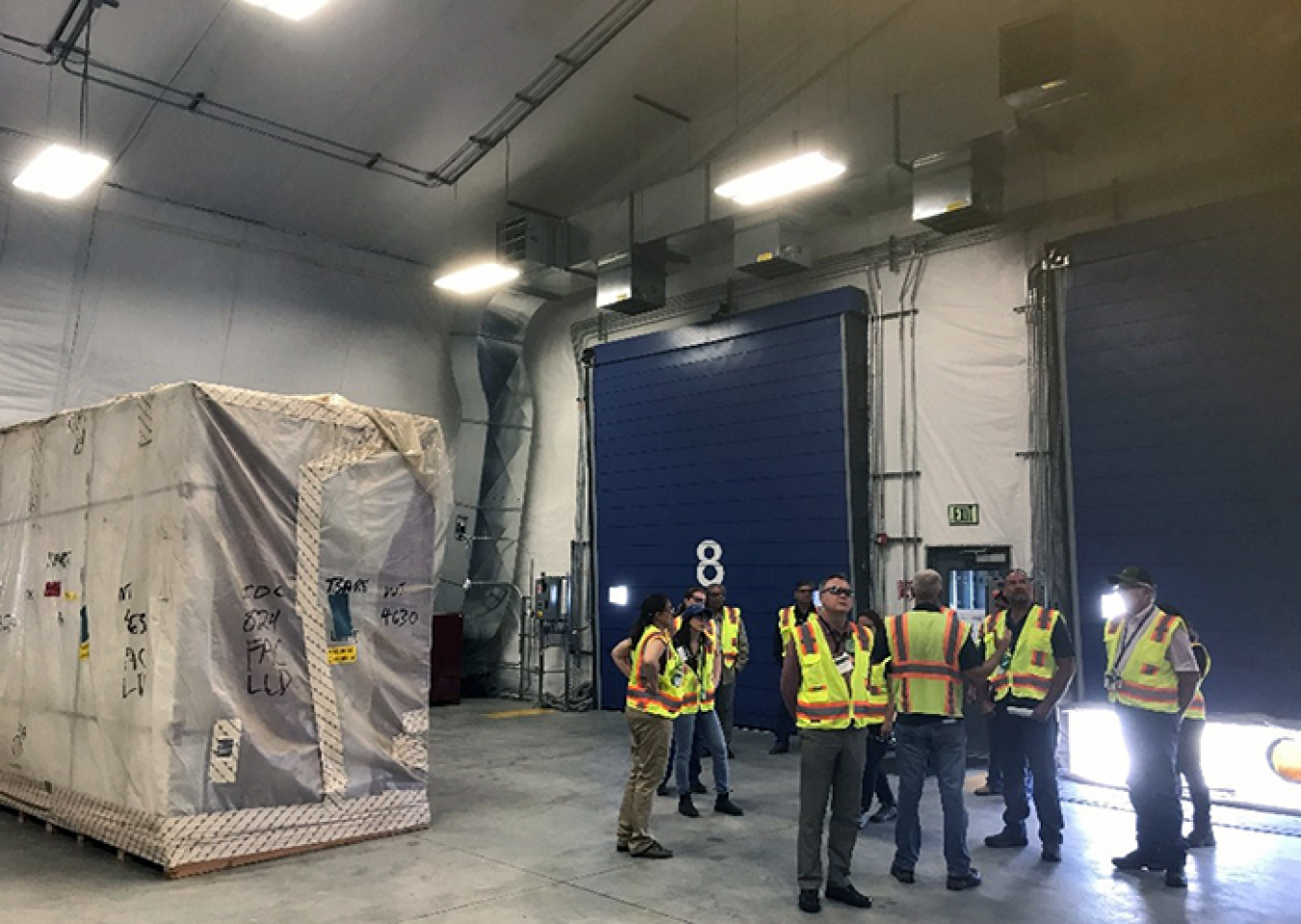 Crews resized gloveboxes containing waste and other large debris after opening 12-foot-high waste boxes from laboratories at EM’s former Mound Site in Ohio.