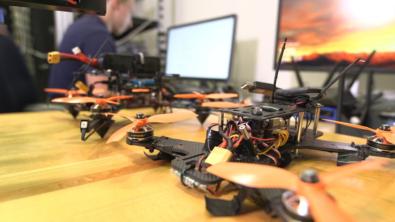 Interns at Sandia National Laboratories built and programmed drones to study autonomy and artificial intelligence for hypersonic flight, similar to the quadcopters seen here. 