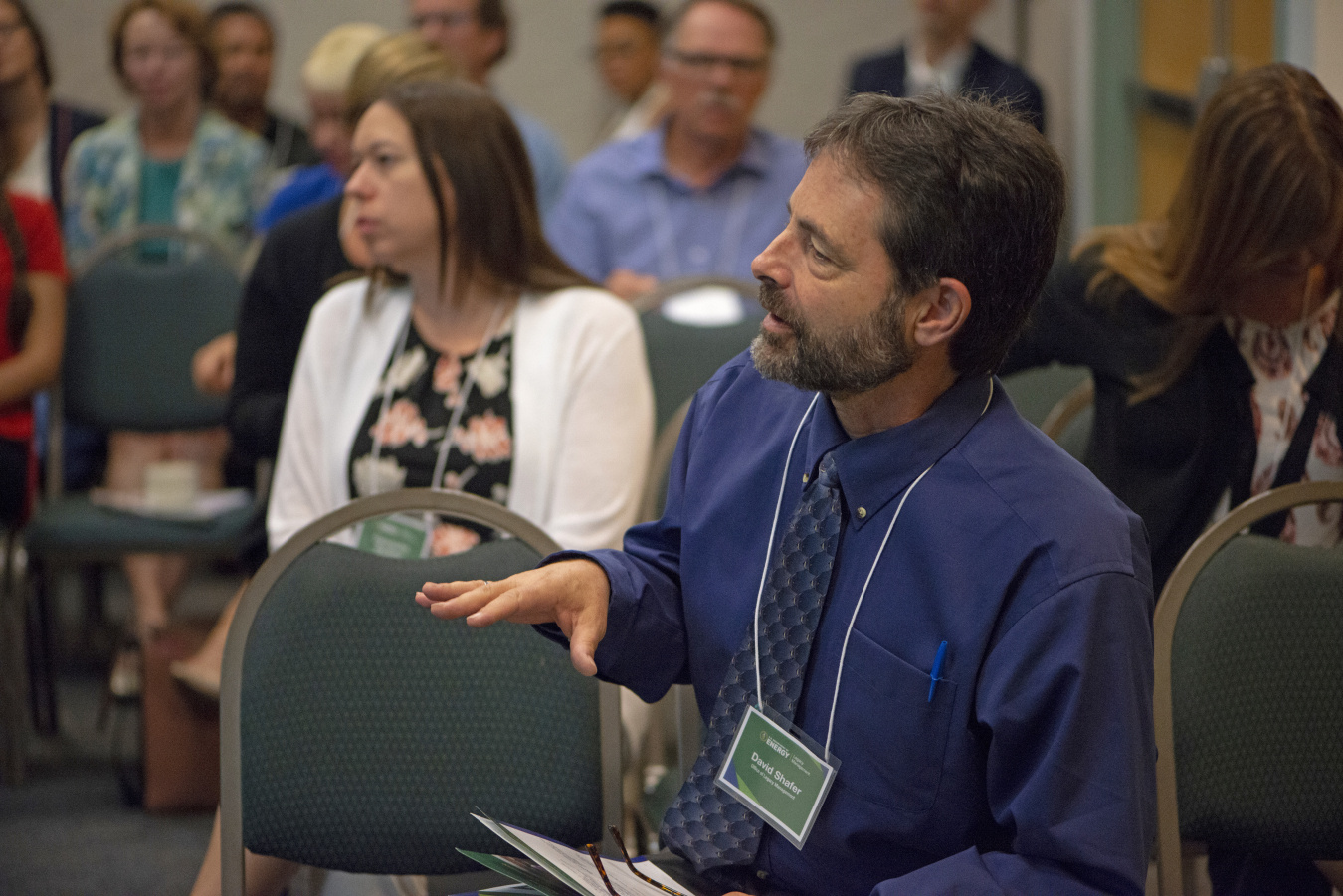 As an audience member, David Shafer provides his insight during a presentation. 
