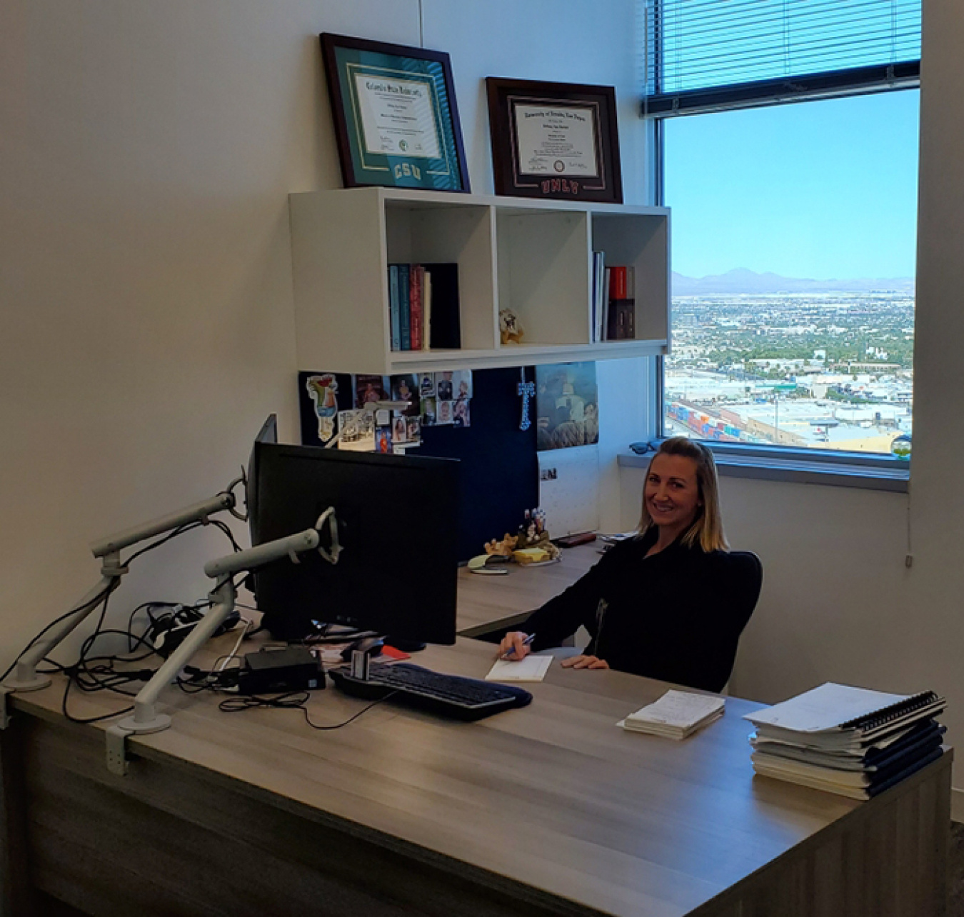EM Nevada Program employee Tiffany Gamero is at work in the program’s new offices at the Molasky Corporate Center in downtown Las Vegas.