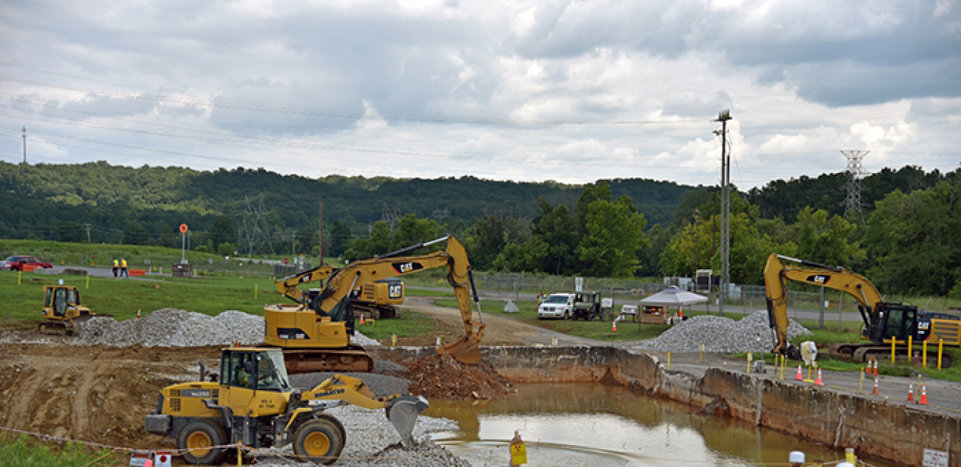 Oak Ridge crews remediate the K-1203 complex site after demolishing structures there.