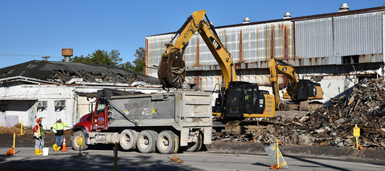 Oak Ridge crews remove debris from the K-1004-J Lab demolition, which began earlier this month.