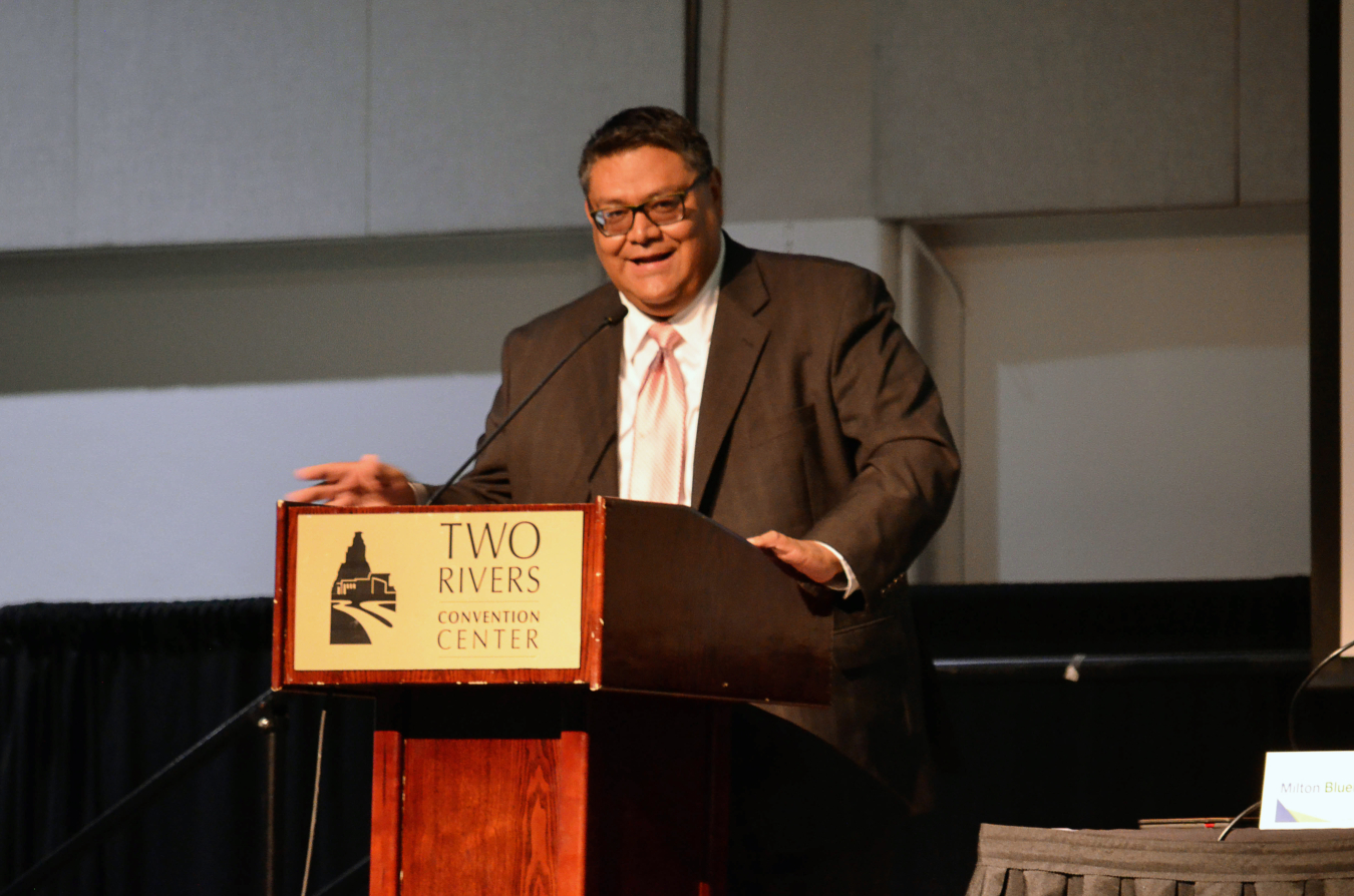 Milton Bluehouse moderates the panel discussion regarding longterm stewardship on tribal land.