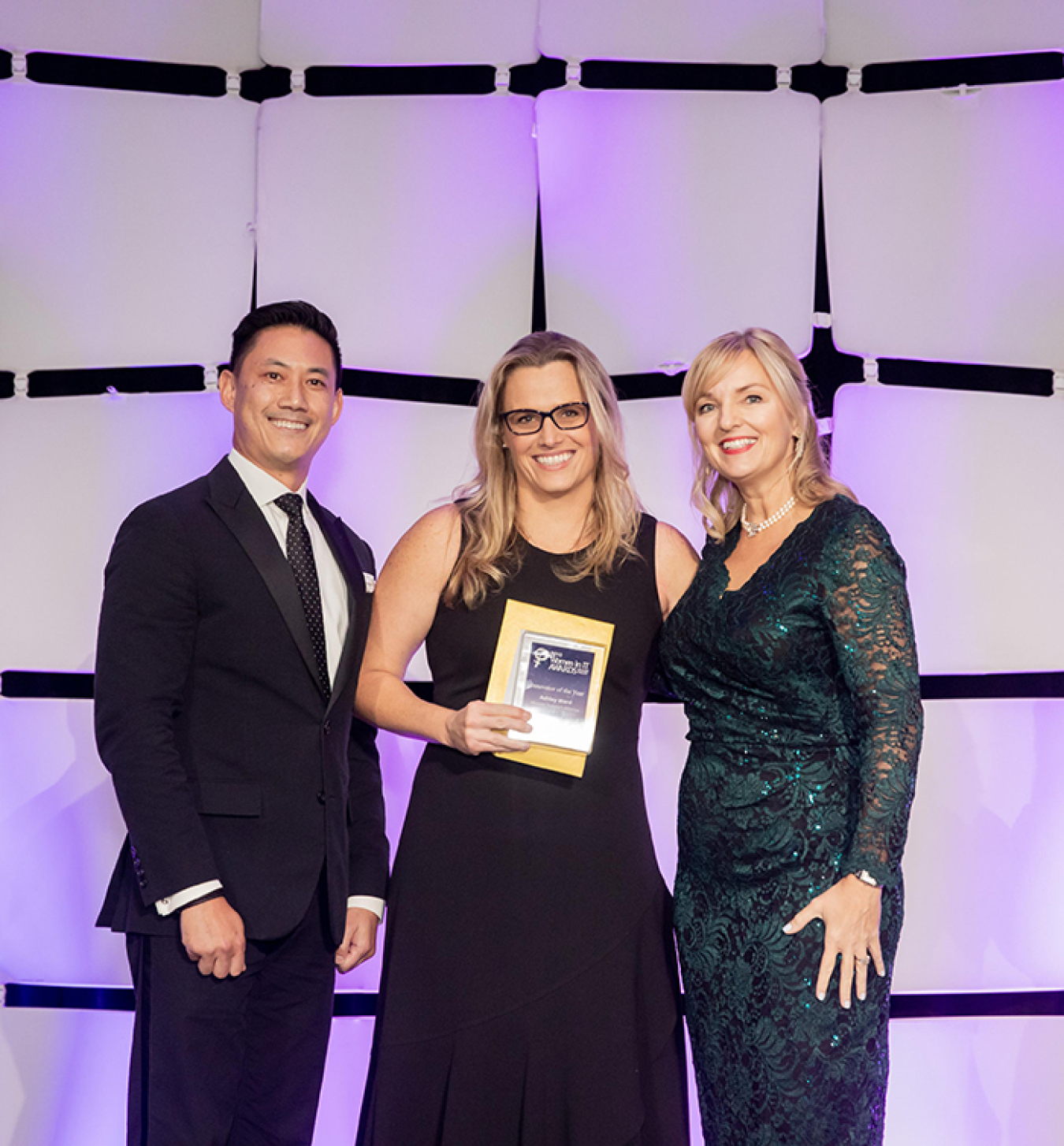 Ashley Ward, center, from EM Richland Operations Office contractor Mission Support Alliance, receives the Innovator of the Year Award at the 2019 Women in IT Awards Silicon Valley ceremony in San Francisco.