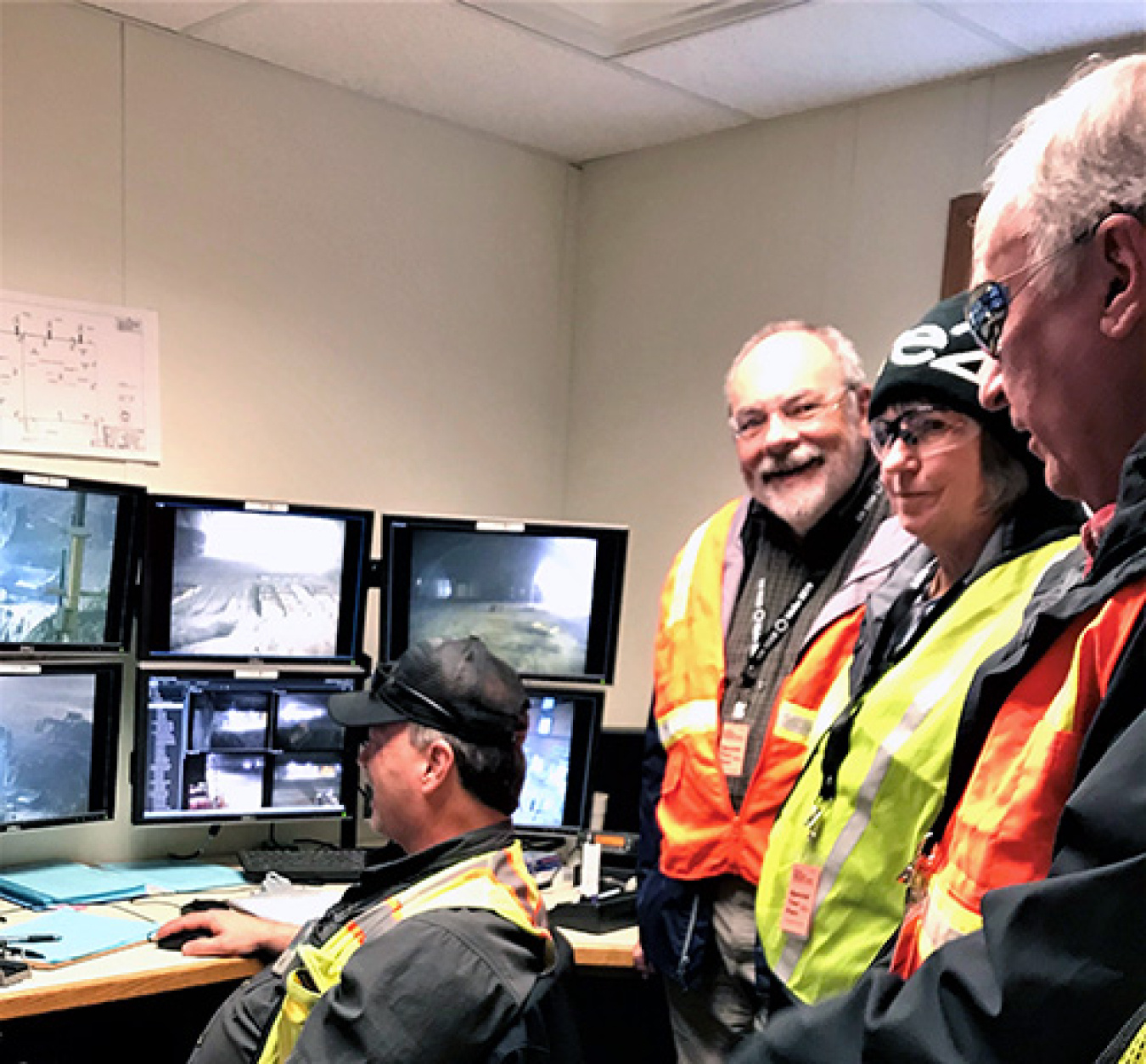 EM Site-Specific Advisory Board Chairs watched EM’s targeted transuranic waste retrieval mission in real time through closed circuit television monitors at the Radioactive Waste Management Complex at the Idaho National Laboratory Site.
