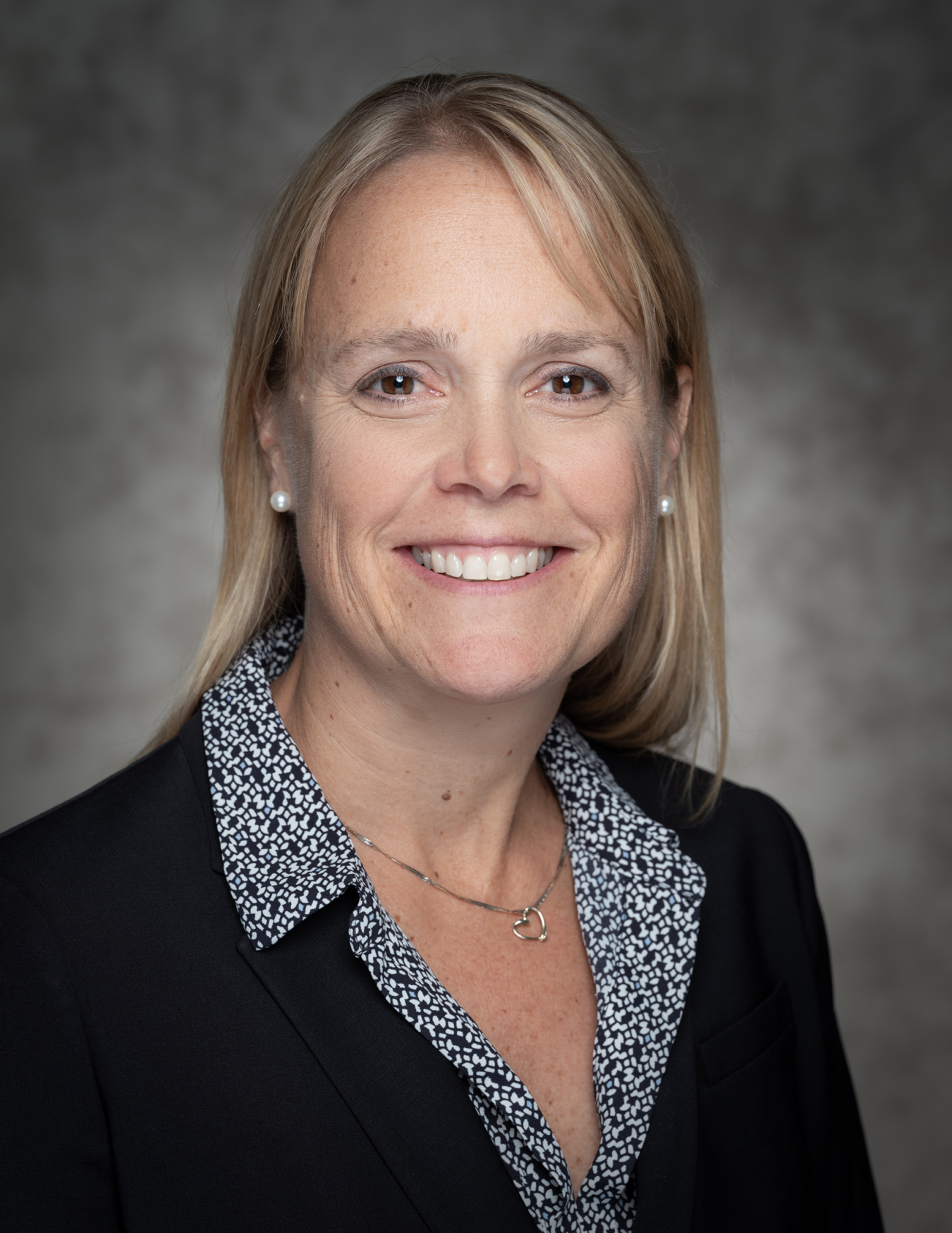 Head and shoulders portrait of Christy Cooper, Acting Business and ITSO Director. 