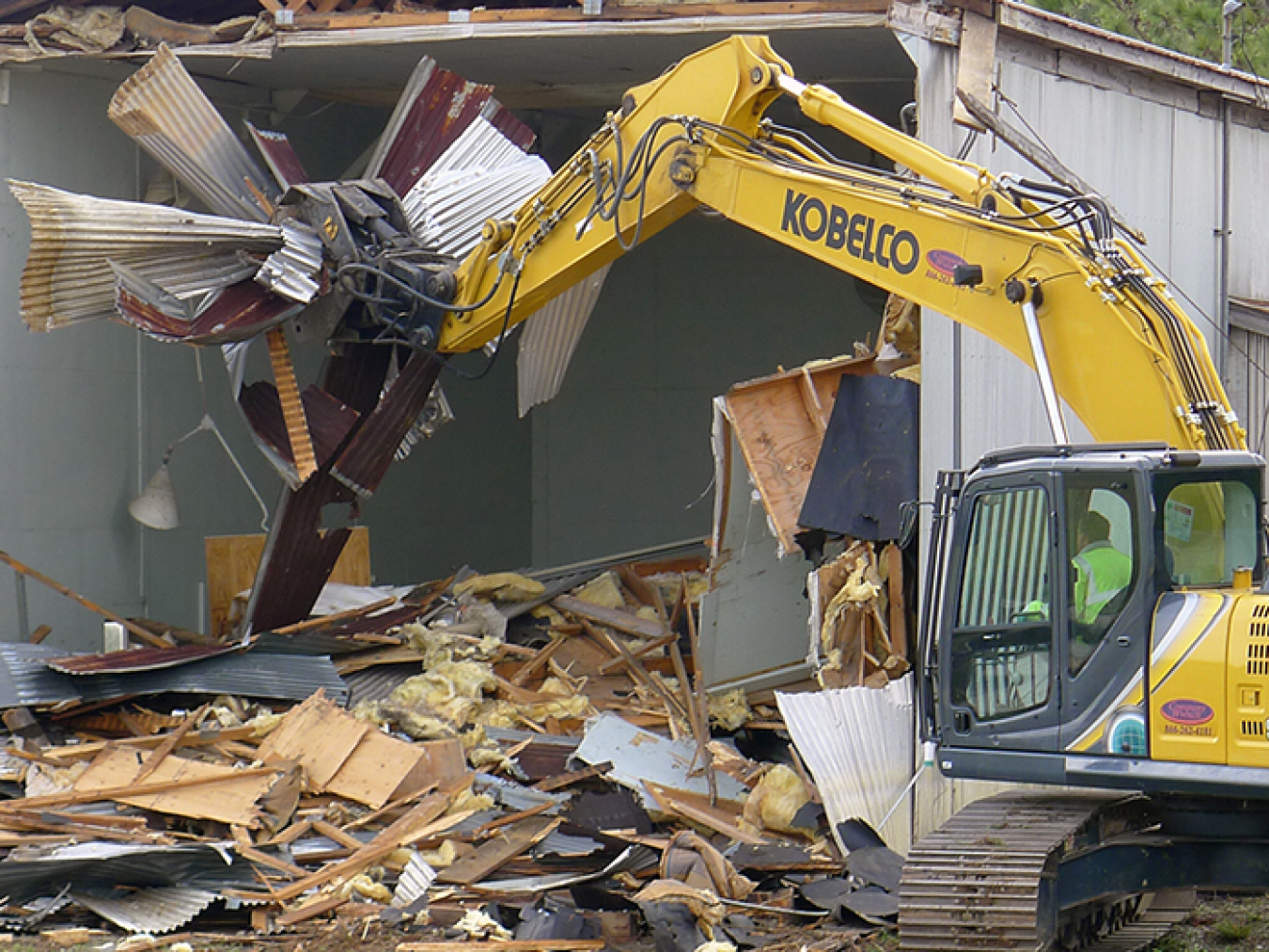 Crews knock down a facility once used to repair cask cars that transported nuclear materials at the Savannah River Site. 