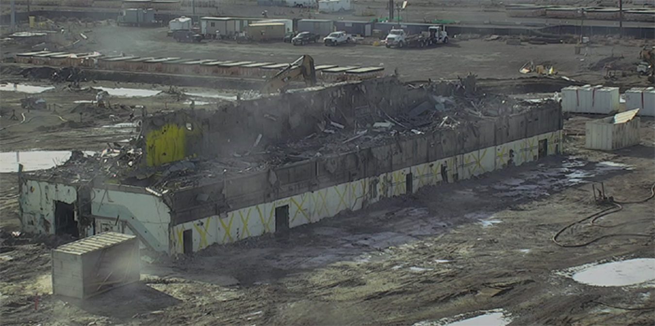 Photos of the Plutonium Finishing Plant’s main processing facility from November 2018, at top, and after the completion of lower-risk demolition last week highlight progress since demolition activities resumed in Sept 2018 with enhanced safety control.o