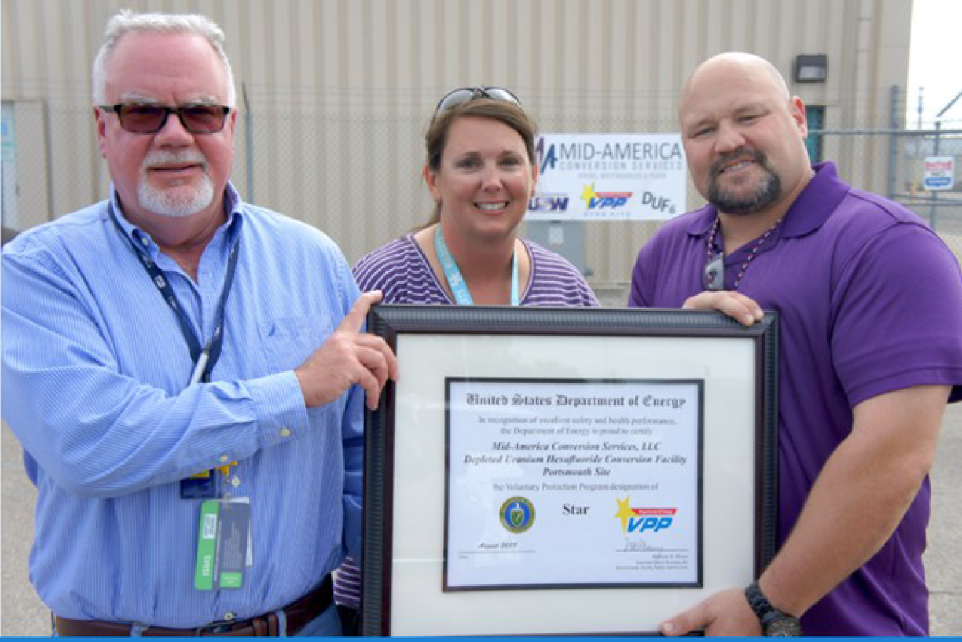 From left, Pete Coutts, Portsmouth plant manager; Tara Warren, Portsmouth logistics manager; and Jeremy Bates, Portsmouth facility manager and Voluntary Protection Program (VPP) coordinator, show their VPP Star certificate.