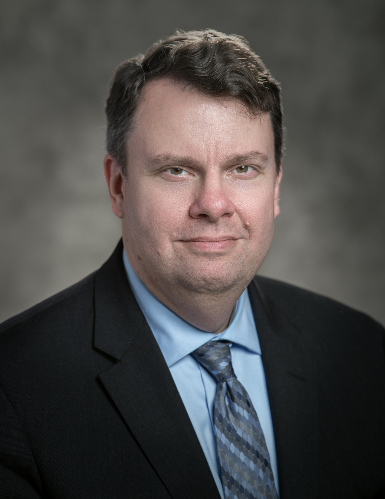 Photo of Christopher Johns, Deputy Chief Financial Officer