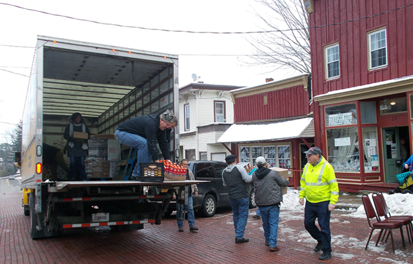 Volunteers in the West Valley Demonstration Project’s annual food drive deliver 44 turkeys and other items to a food pantry in Cattaraugus, New York.