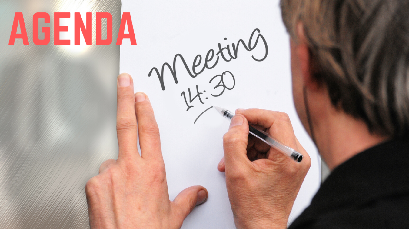 A person writing the words "meeting" on a white board. Then the word "agenda" overlaying the photo.